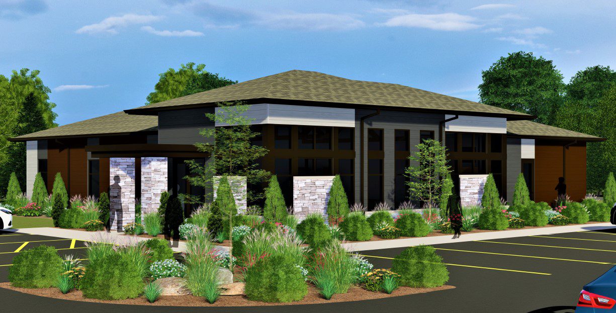 Exterior rendering of modern dental building with lush landscaping