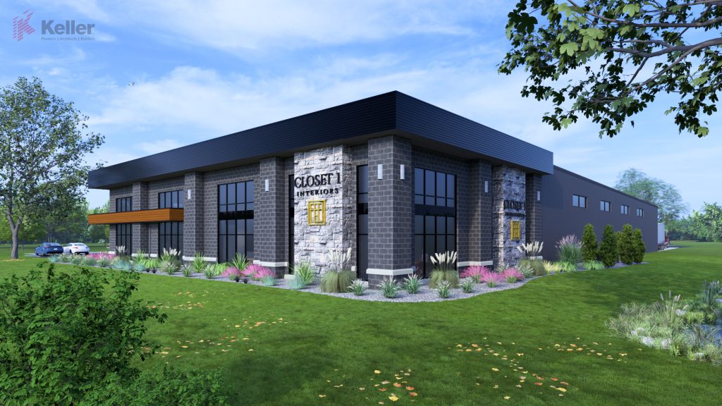 Modern building exterior of Closet 1 Interiors showcasing a sleek design with gray stone and large windows, surrounded by landscaped greenery and colorful plants. The entrance features a prominent sign indicating the business name, set against a clear blue sky.