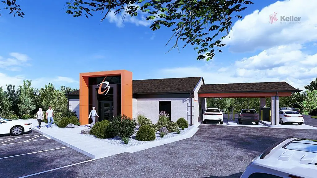 Modern commercial building with an inviting entrance featuring an orange accent, surrounded by lush greenery and ample parking. Several pedestrians are approaching the entrance, showcasing accessibility and appeal. Clear blue skies enhance the visual appeal of the property.
