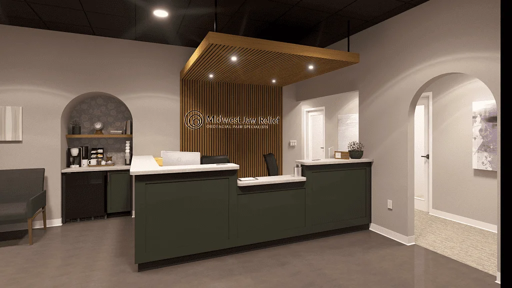 Modern dental office reception area featuring the Midwest Jaw Relief logo, stylish cabinetry, and an inviting atmosphere with comfortable seating, designed to enhance patient experience in orofacial pain management.